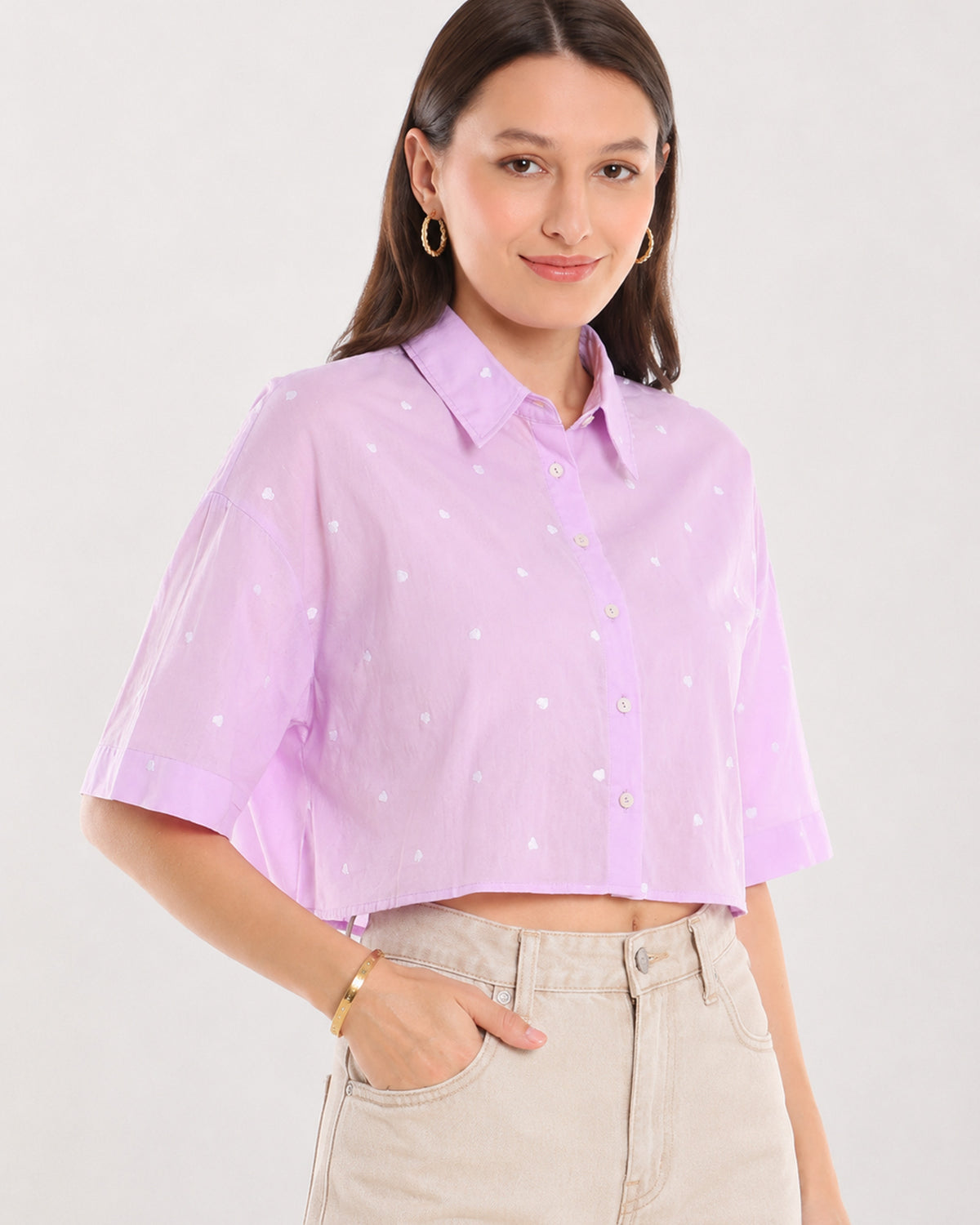 Christian lavender cropped shirt angled view showing cropped length worn untucked