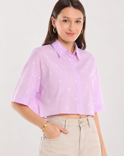 Christian lavender cropped shirt angled view showing cropped length worn untucked