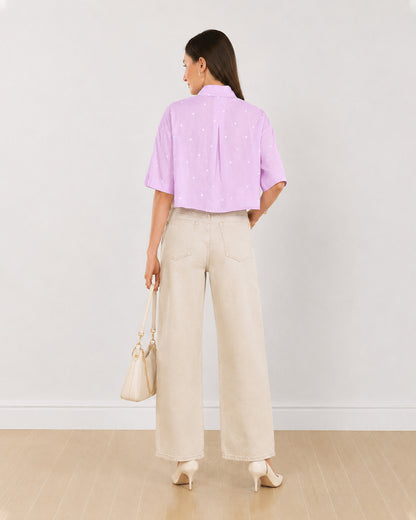 Back view of Christian lavender cropped shirt showing back yoke pleat and cropped hem