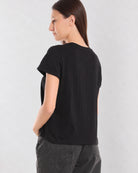 Back view of Christiana black 100% cotton t-shirt showing plain back and boxy fit