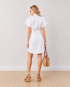Daisy white embroidered cotton shirt dress, back view showing the belted waist