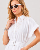 Close-up of Daisy shirt dress front embroidery and placket with hidden dignity buttons