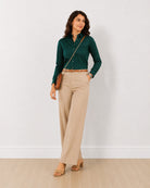 Dame bottle green stretch cotton tailored shirt with a snug fit and full sleeves, angled front view