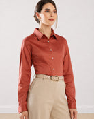 Dame terracotta brown shirt showing the collar, front waist dart and placket dignity buttons, front view
