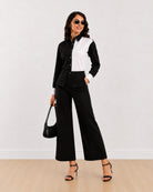 Dana colour blocked cotton shirt with black full sleeves and white cuffs, angled front view