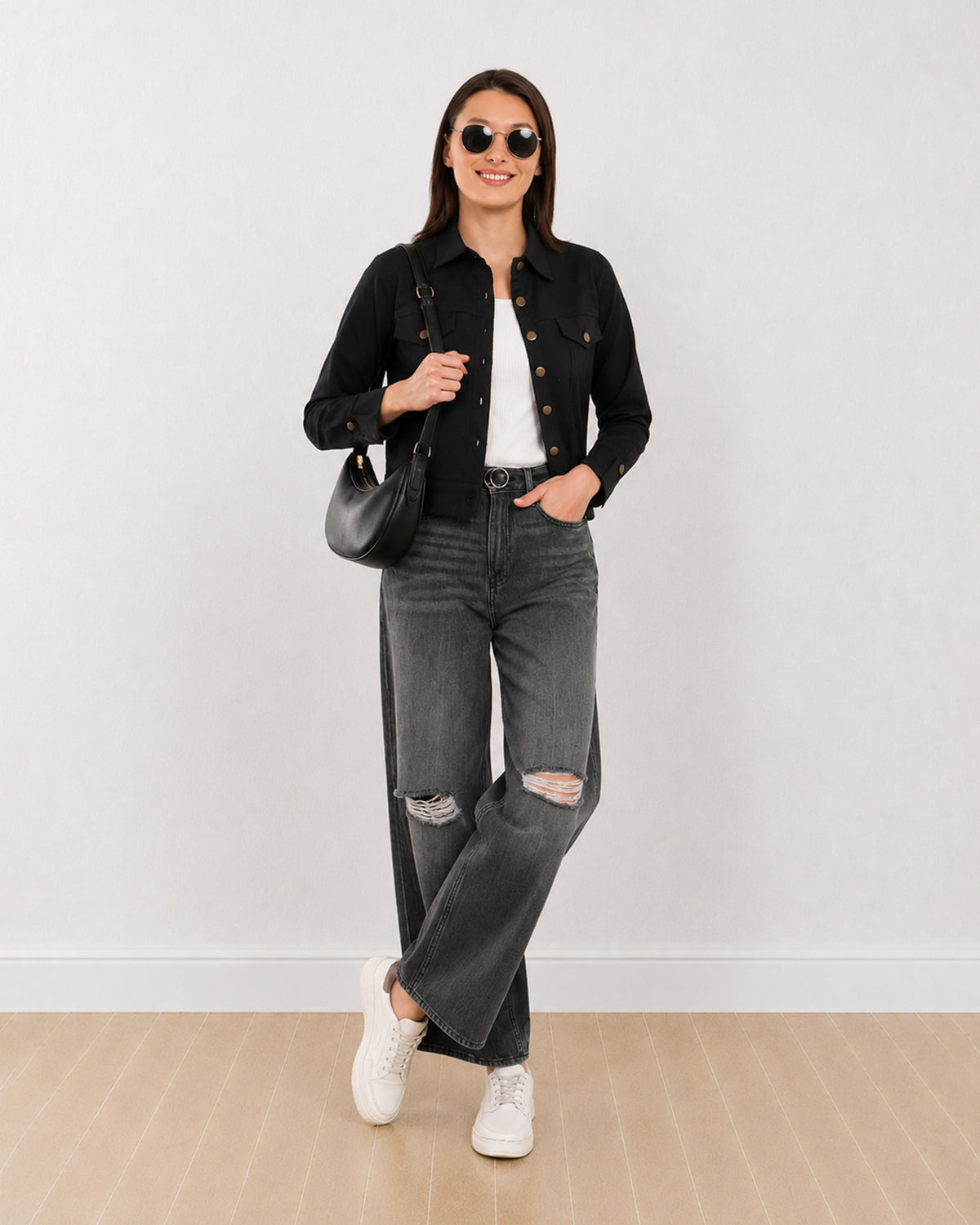 Dani black cotton twill trucker jacket with a cropped length, angled front view
