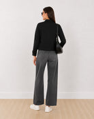 Dani black cropped trucker jacket, back view showing the boxy fit and straight hem