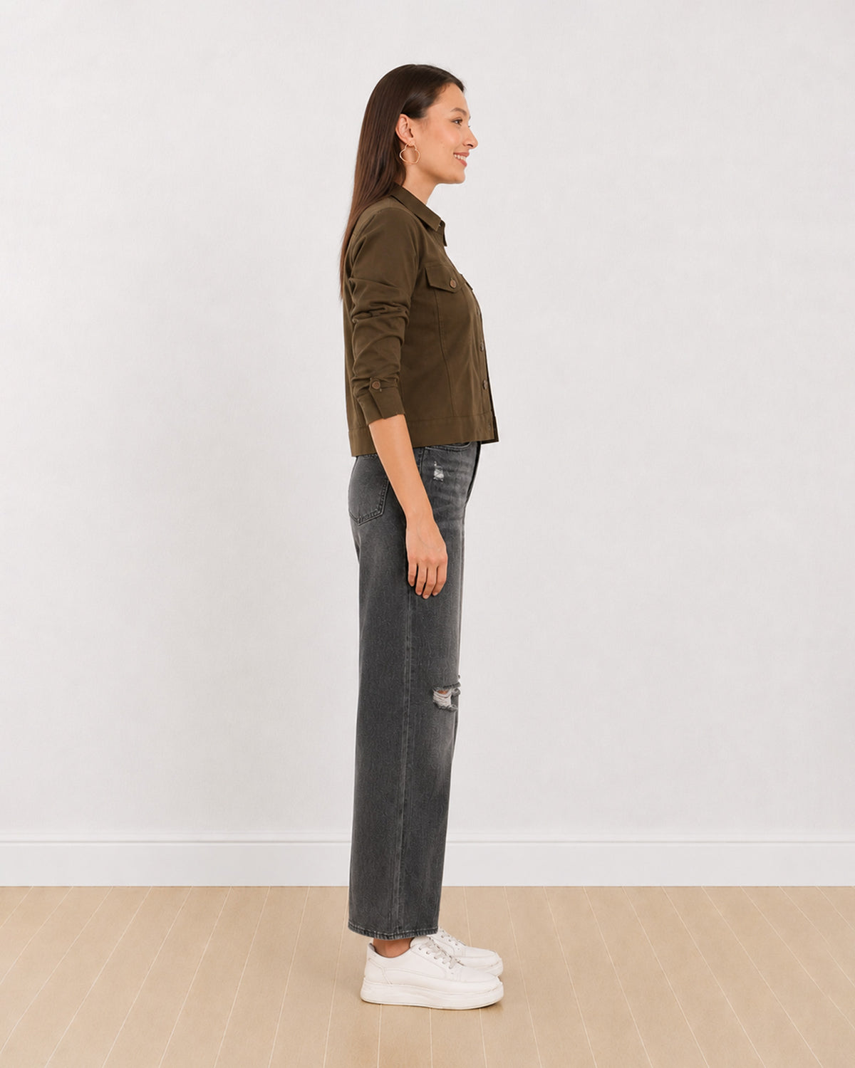 Dani olive green cropped trucker jacket with a boxy fit, side profile view