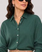 Close-up of Daphne shirt subtle silver lurex stripes, collar and placket with dignity buttons