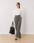 Darleen white formal shirt with a curved hem and a snug fitted shape, angled front view