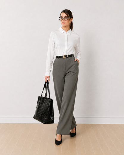 Darleen white formal shirt with a curved hem and a snug fitted shape, angled front view