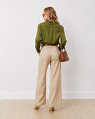 Darlina olive green striped shirt, back view showing the shoulder yoke and striped back