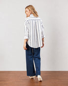 Darlina white striped shirt, back view showing the striped back and long curved hem