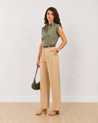 Darren sage green cotton shirt with studded cap sleeves, angled front view