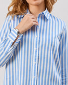 Close-up of Dede striped shirt collar and front placket with hidden dignity buttons