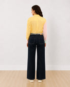 Deera pastel colour blocked shirt, back view showing the yellow back yoke and a contrast pink sleeve