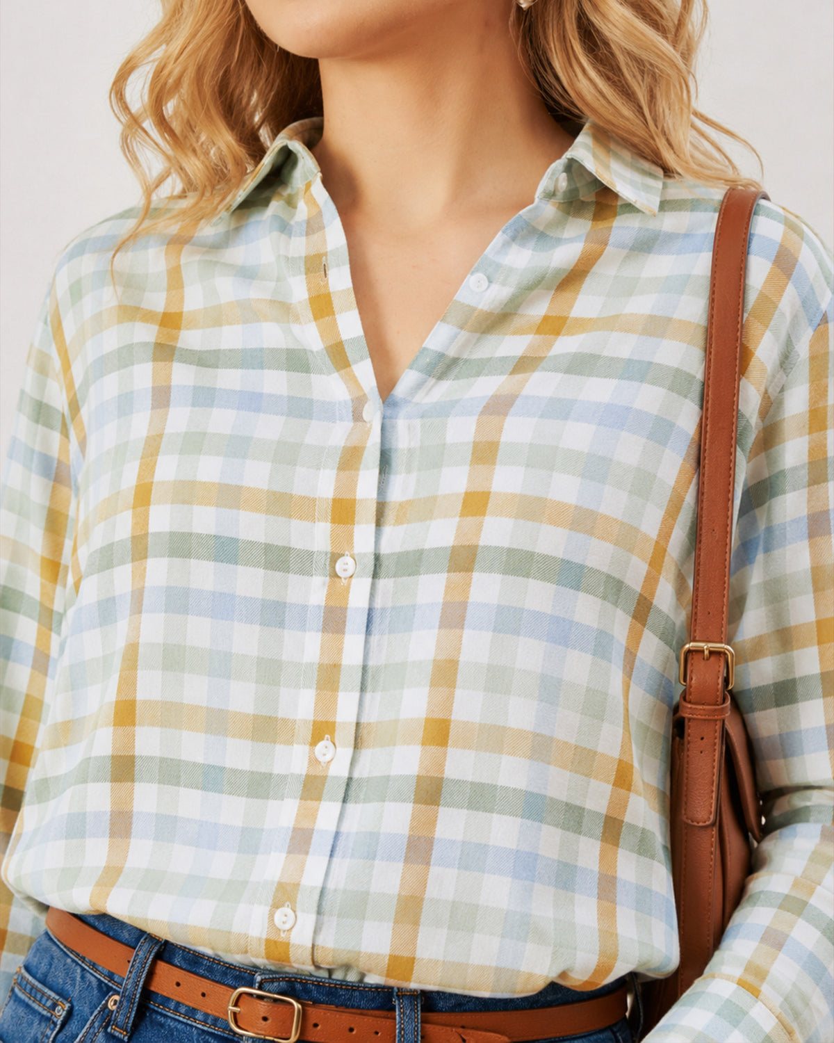 Delnaz multi-colour checked shirt detail, pointed collar and hidden dignity buttons