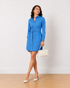 Demi bright blue cotton poplin shirt dress, full length walking front view