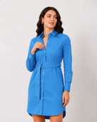 Demi bright blue shirt dress, waist up front view with buttoned placket and collar