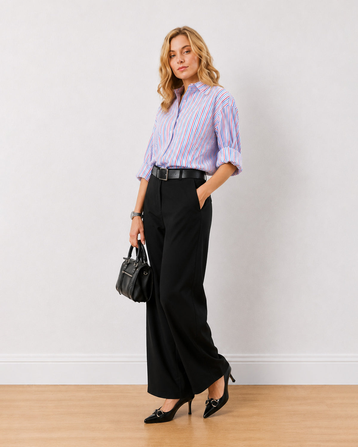 Diane black mid waist formal trousers, angled front view of the wide leg