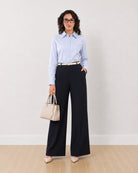 Gazillion Diane navy blue mid waist formal trousers for women, full length front view of the wide leg fit