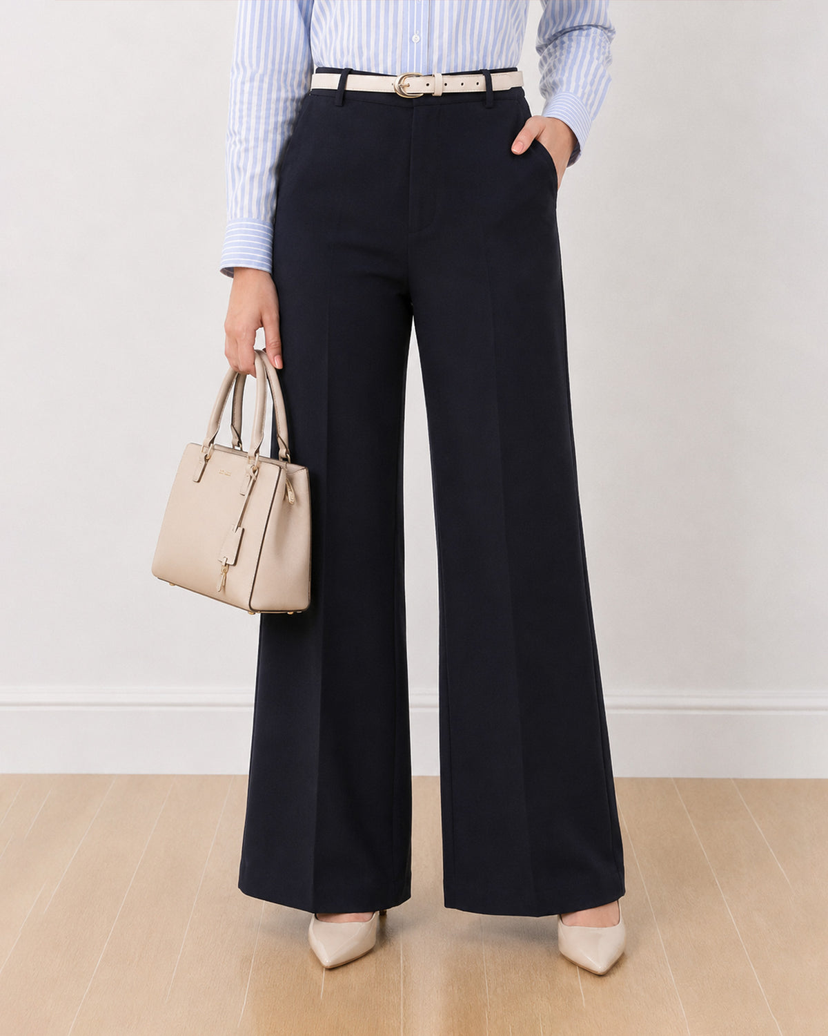 Diane navy blue formal trousers, waist down front view of the mid waist wide leg