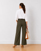 Diane olive green mid waist wide leg formal trousers, back view of the full length