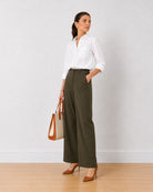 Gazillion Diane olive green mid waist formal trousers for women, full length front view of the wide leg fit