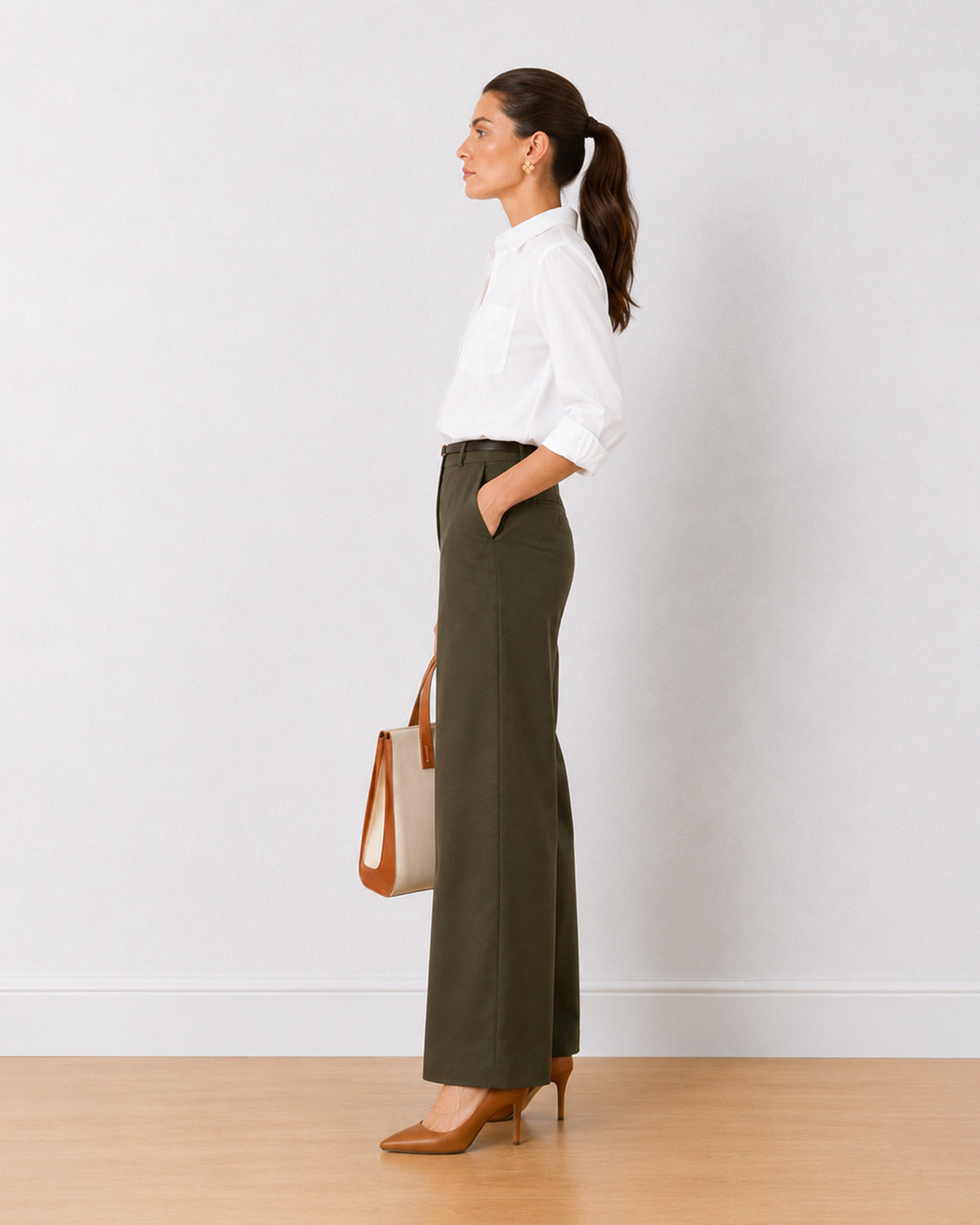 Diane olive green formal trousers, side profile view of the full length wide leg