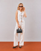 Gazillion Dina white sleeveless vest and voile lined trousers co-ord set for women, full length front view