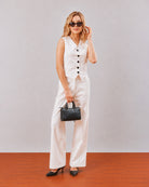 Gazillion Dina white sleeveless vest and voile lined trousers co-ord set for women, full length front view