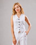 Dina white cotton linen vest co-ord set, waist up front view with V neck and buttons