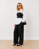 Dixie black and white shirt corset set, angled front view with curved hem left untucked