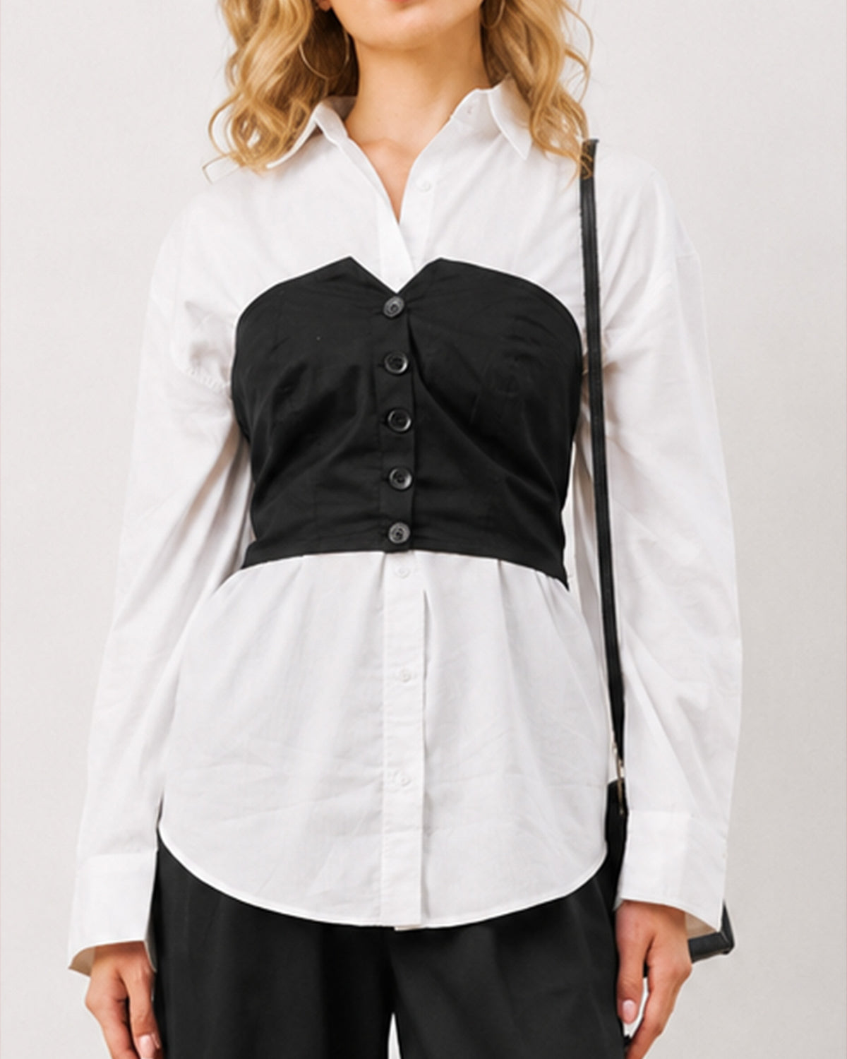Dixie black tube corset over the white oversized shirt, close up front detail