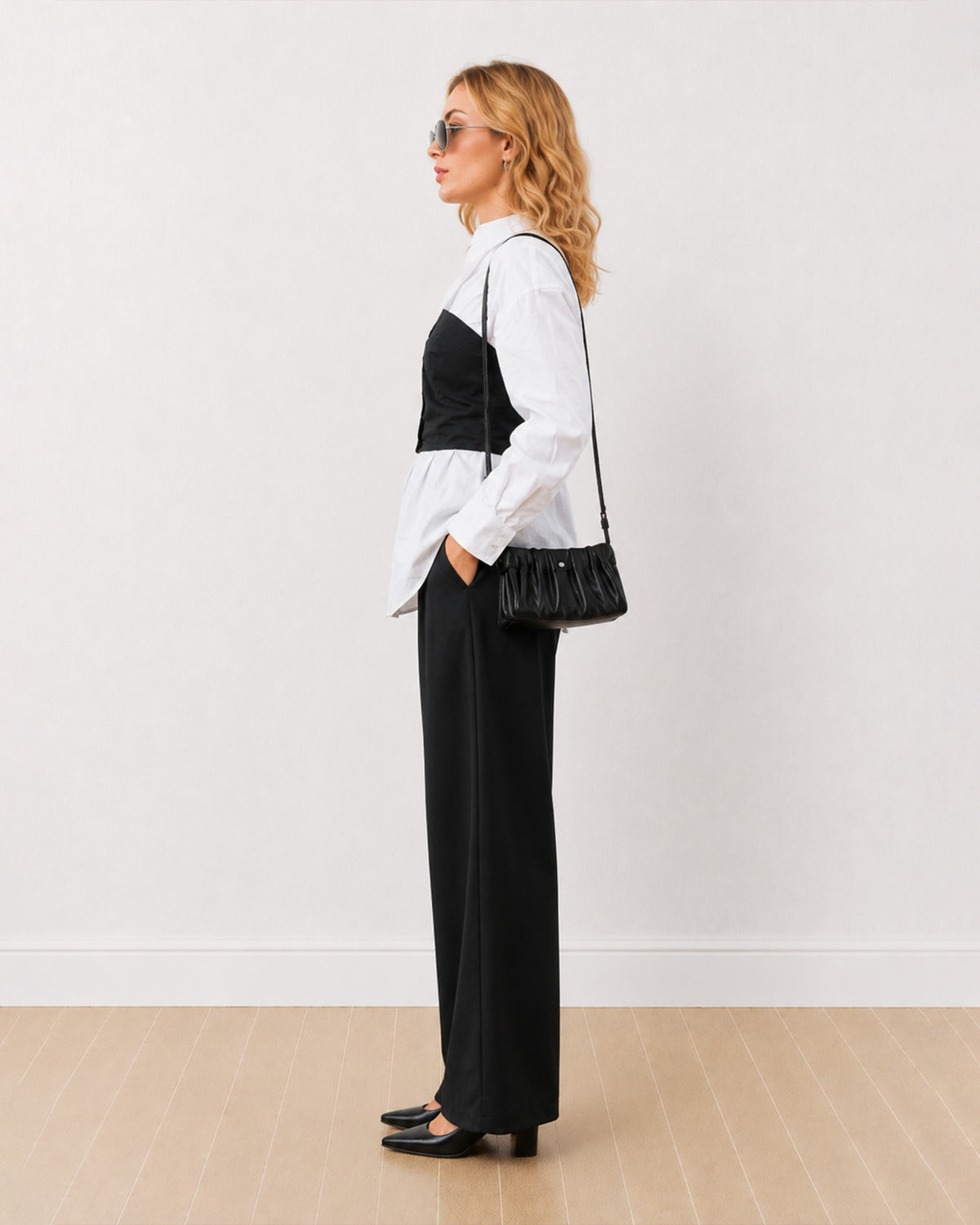 Dixie black and white shirt corset set, side profile view of the long oversized length