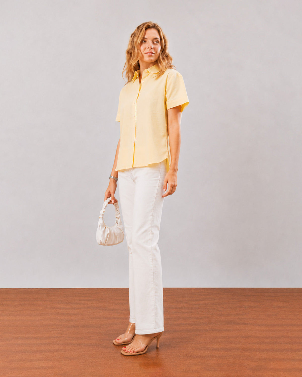 Doll lemon yellow cotton linen short sleeves shirt, boxy fit angled front view