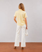 Doll lemon yellow formal shirt, back view showing the gathers on the back yoke
