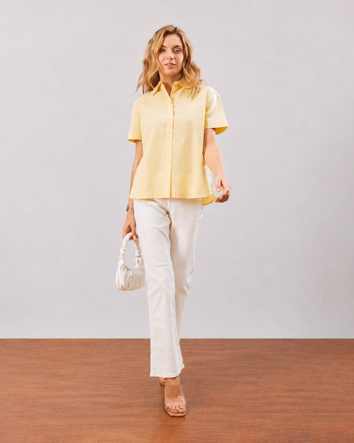 Doll lemon yellow short sleeves shirt, full length walking front view worn untucked