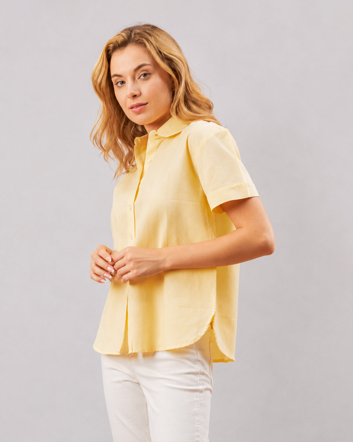 Doll lemon yellow shirt, waist up front view with hidden dignity buttons in the placket