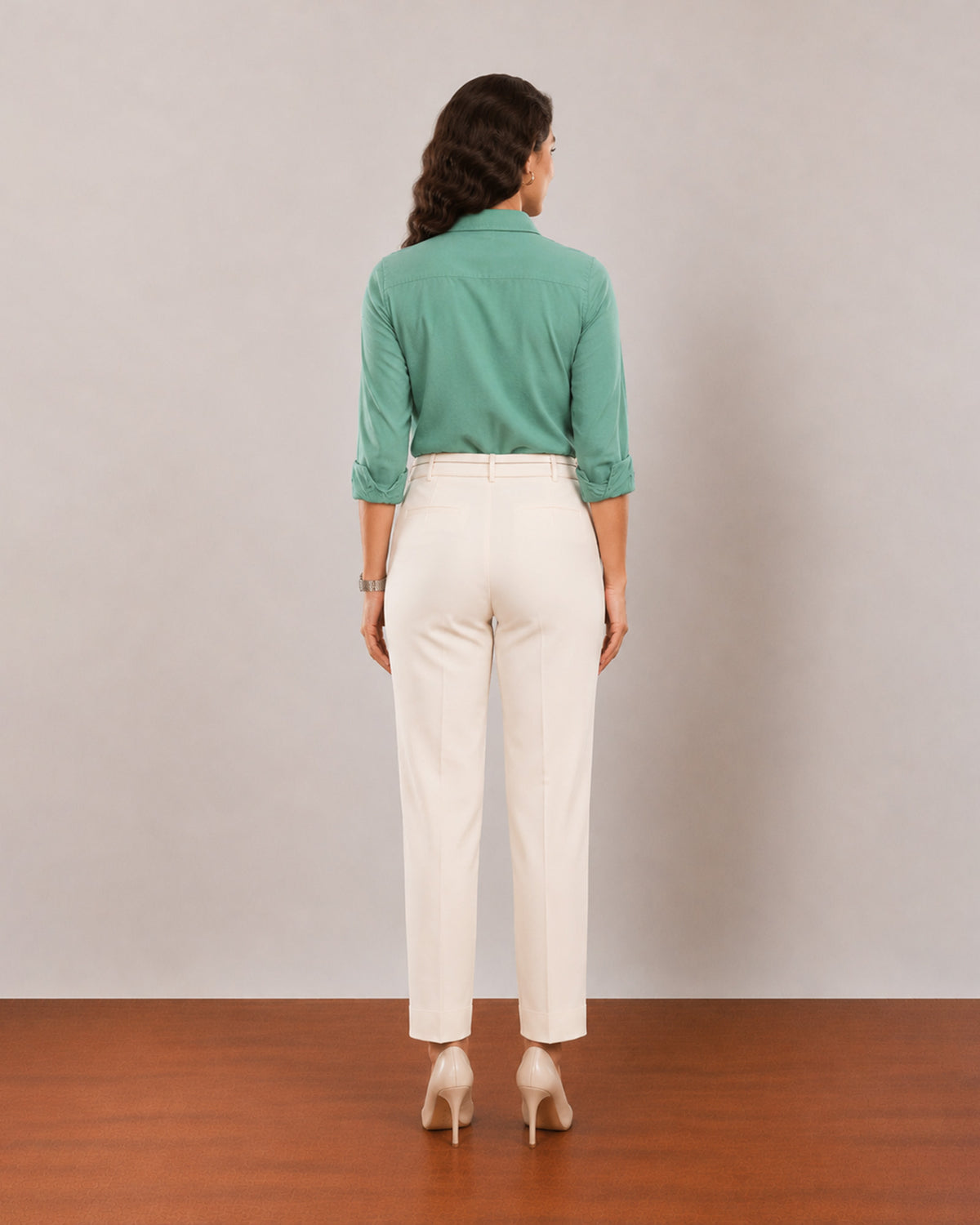 Dora emerald green formal shirt, back view showing the centre back pleat