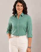 Dora emerald green cotton linen shirt detail, pointed collar and hidden dignity buttons