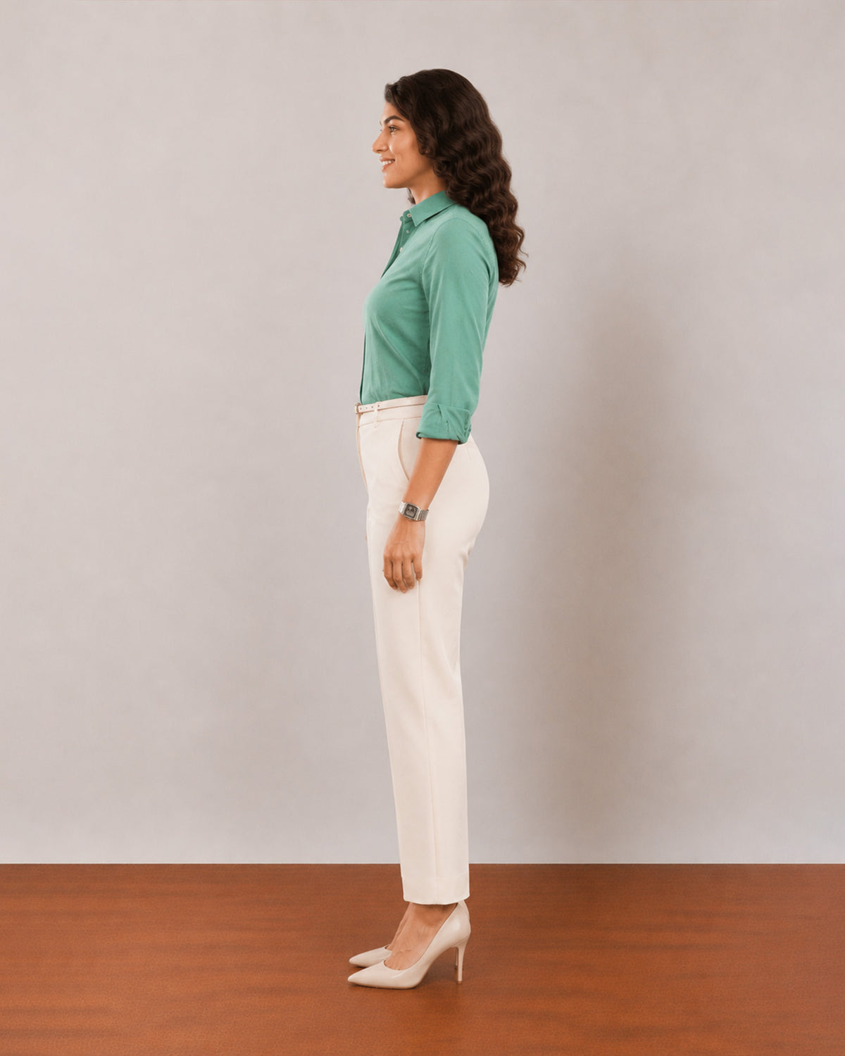 Dora emerald green cotton linen shirt, side profile view of the straight fit