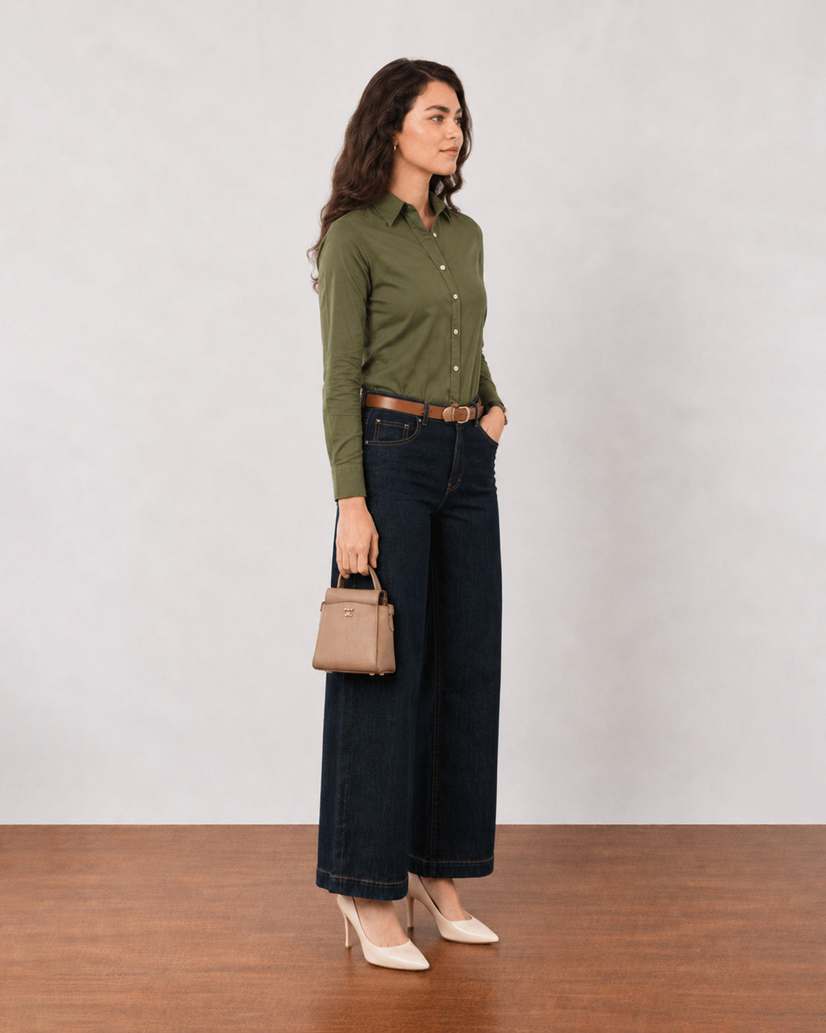 Dora olive green cotton linen shirt, side profile view with sleeves rolled up