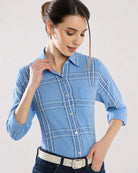 Close-up of Earnia blue checks cotton shirt collar and shoulder stitching