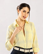 Close-up of Earnia yellow checks cotton office shirt collar and neckline