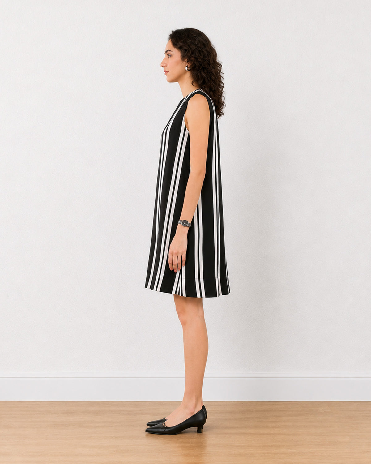 Elenora striped sleeveless shift dress, knee length, side profile view