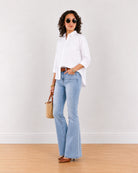 Elizabeth white boxy cotton shirt with 3/4 sleeves, angled front view