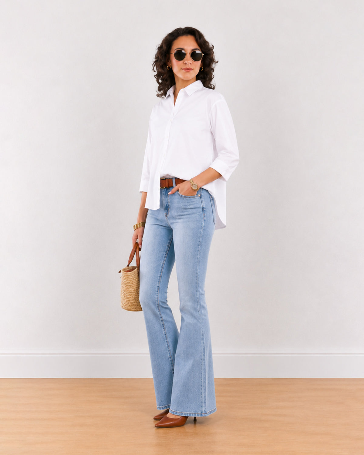Elizabeth white boxy cotton shirt with 3/4 sleeves, angled front view