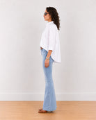 Elizabeth white pleated back cotton shirt with all-over back pleats, side profile view