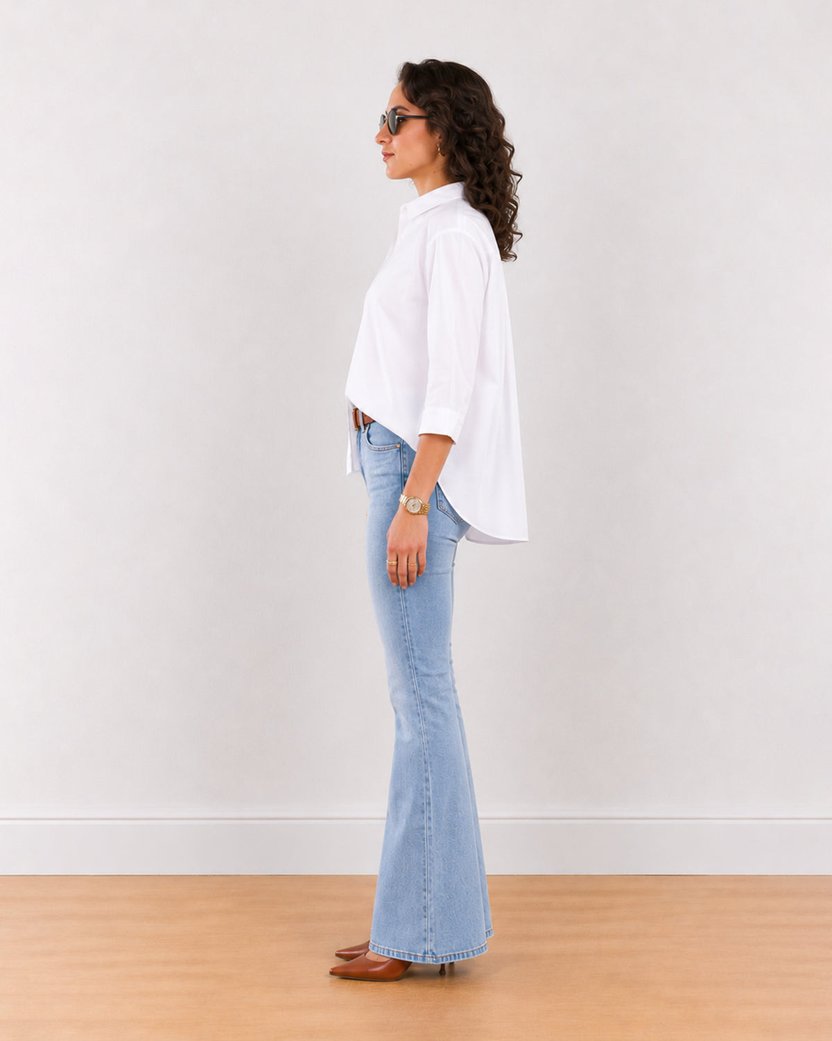 Elizabeth white pleated back cotton shirt with all-over back pleats, side profile view